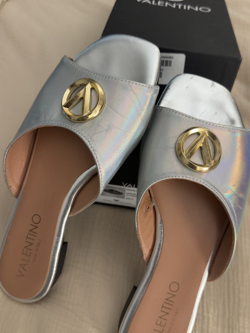 Valentino Iridescent Silver Slide Mules with Gold Logo Medallion